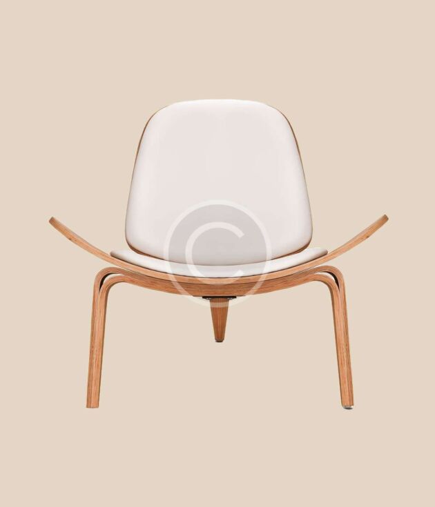 White molded accent chair with wood frame